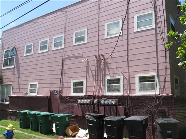 2520 Hopkins Street, Unit I Houston, TX 77006 - Photo 2 of 9 a front view of a house with a yard