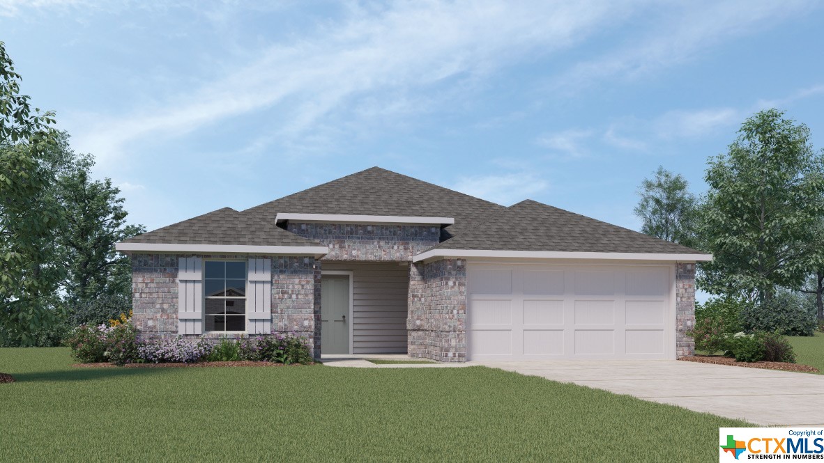 505 Chaco Loop Seguin, TX 78155 - Photo 1 of 1 a front view of a house with a garden and yard