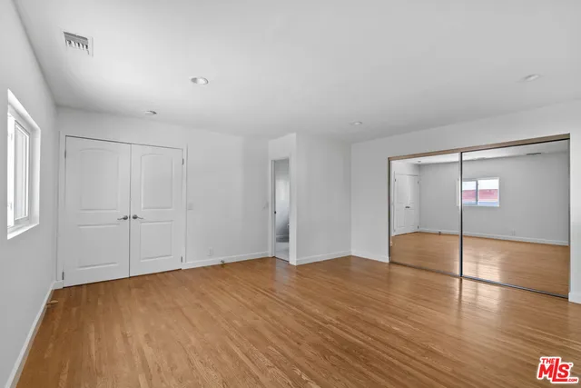 a potted plant sitting on the side of a building