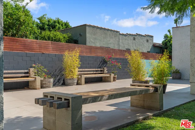 a view of a house with a street