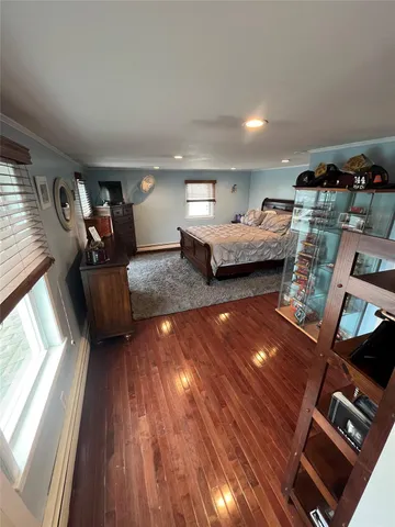 a view of a livingroom with furniture and a flat screen tv