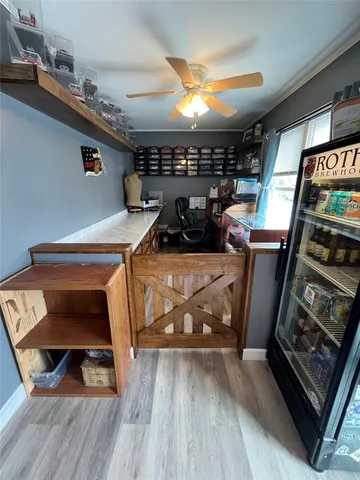 a view of walk in closet with clothes
