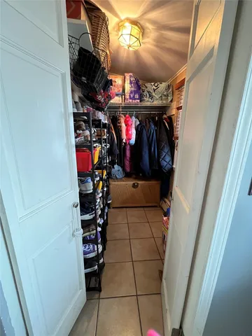 a view of living room with furniture and window