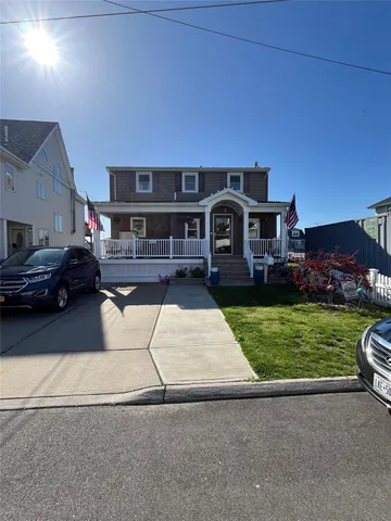 a view of living room with furniture and a rug