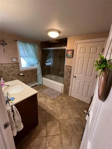 a view of parking garage with cars