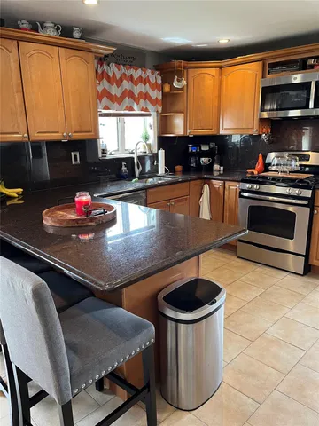 a room with furniture and a flat screen tv