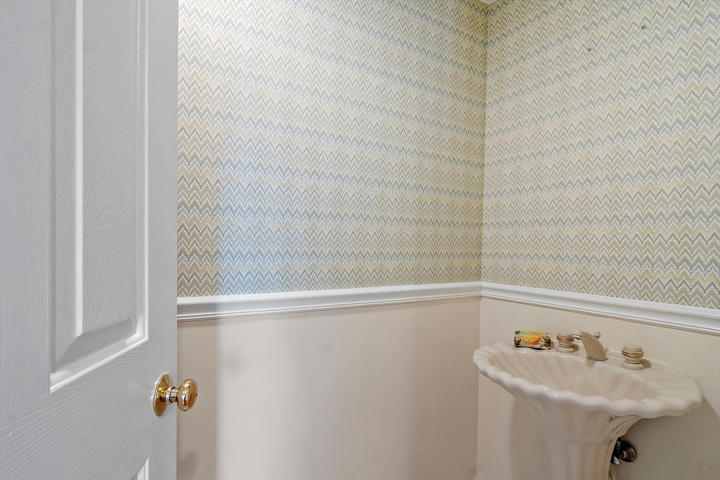 28 Partridge Lane, Unit 28 Lynnfield, MA 01940 - Photo 25 of 41 a bathroom with a sink and a shower