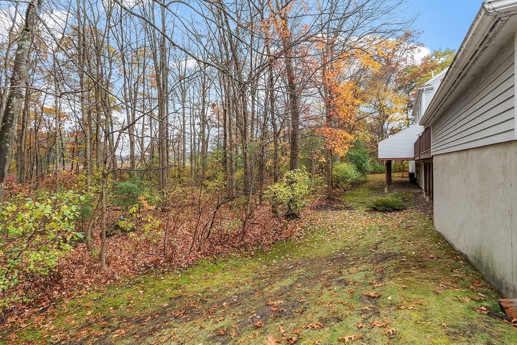 28 Partridge Lane, Unit 28 Lynnfield, MA 01940 - Photo 40 of 41 a view of backyard of the house