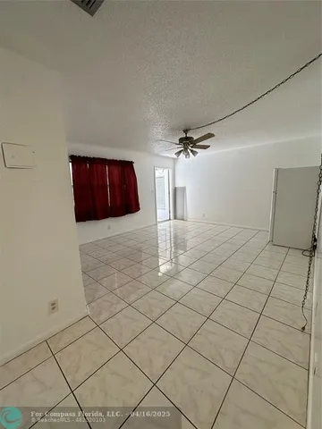 a view of a backyard of the house