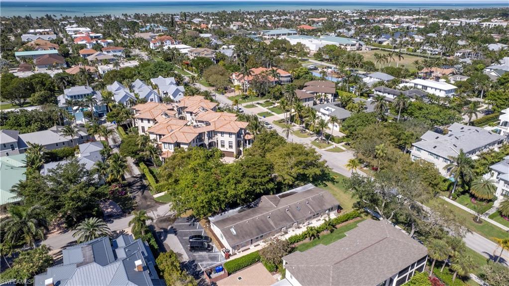 1019 7th Street South Naples, FL 34102 - Photo 24 of 30 an aerial view of a house with a yard