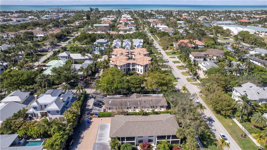 1019 7th Street South Naples, FL 34102 - Photo 25 of 30 an aerial view of a city with lots of residential buildings