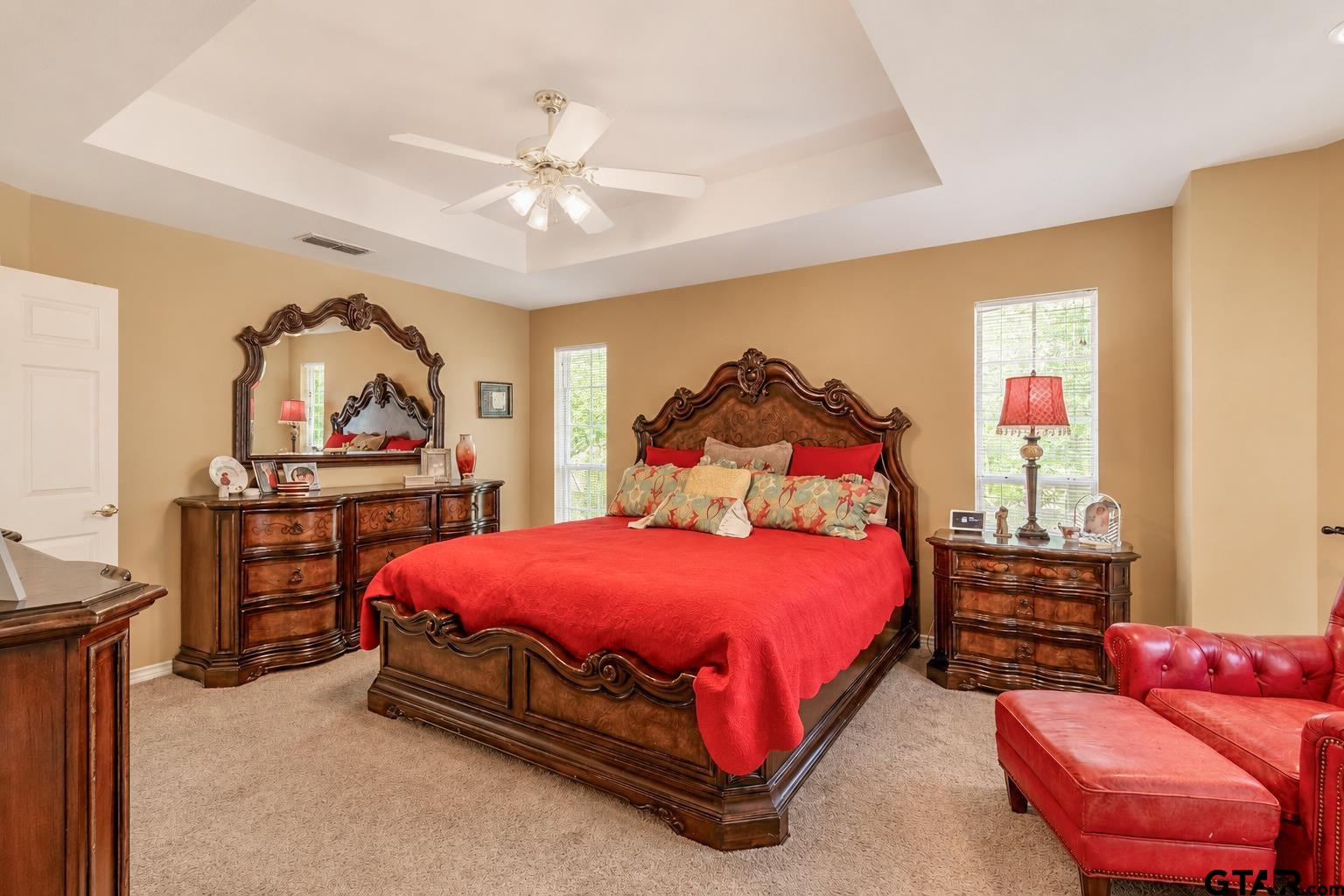 1388 Santa Fe Trail Tyler, TX 75703 - Photo 30 of 46 a bedroom with a bed and dresser
