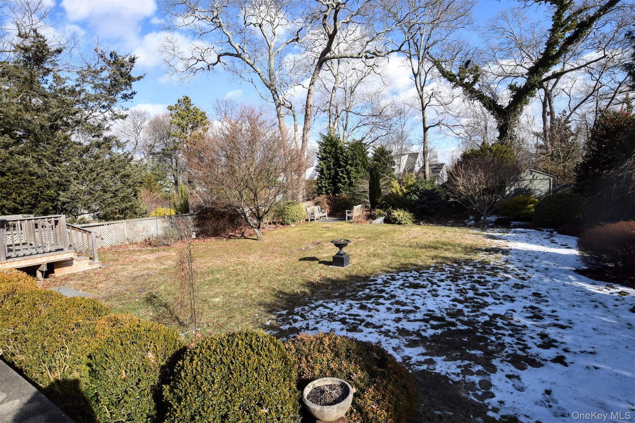 41 Country Club Road Bellport, NY 11713 - Photo 18 of 18 View of yard with a wooden deck