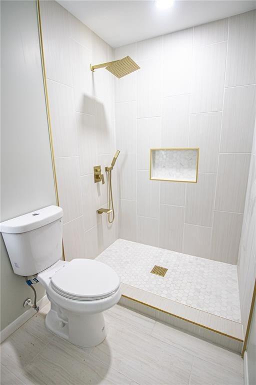 3699 Larkspur Terrace Decatur, GA 30032 - Photo 13 of 29 a bathroom with a toilet and a shower
