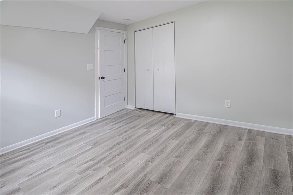 3699 Larkspur Terrace Decatur, GA 30032 - Photo 15 of 29 a view of an empty room with wooden floor