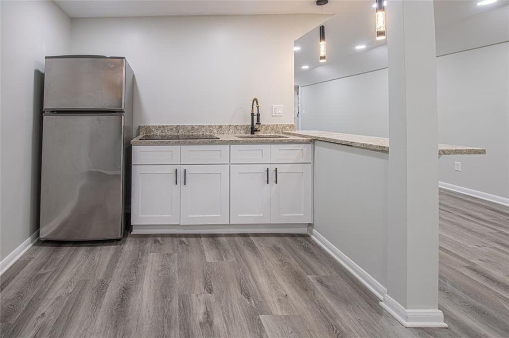 3699 Larkspur Terrace Decatur, GA 30032 - Photo 22 of 29 a bathroom with a sink and a mirror