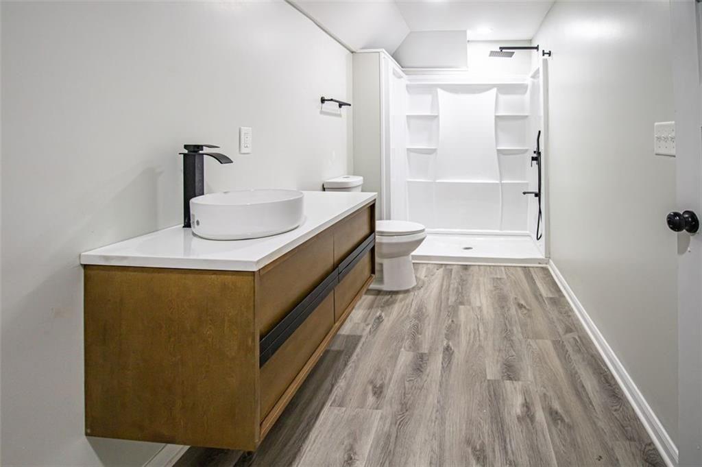 3699 Larkspur Terrace Decatur, GA 30032 - Photo 24 of 29 a bathroom with a sink and a mirror