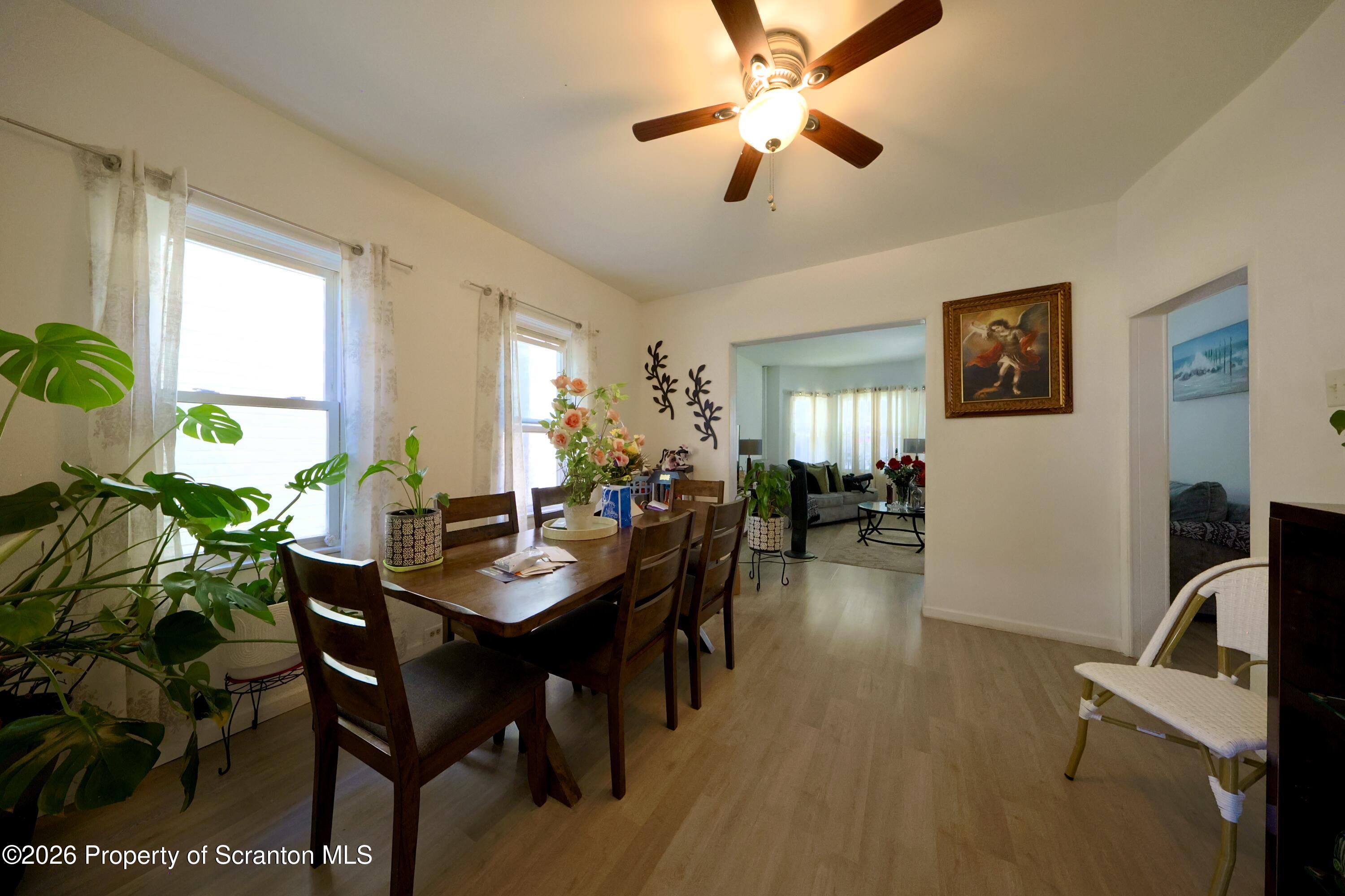 1016-1018 Diamond Avenue Scranton, PA 18508 - Photo 4 of 15 a view of a livingroom with furniture and a dining table