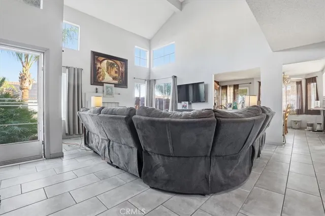 a living room with a couch and a table