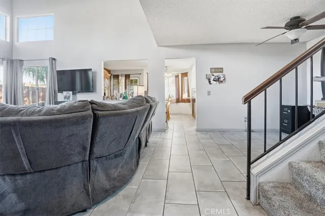 a living room with couches and furniture