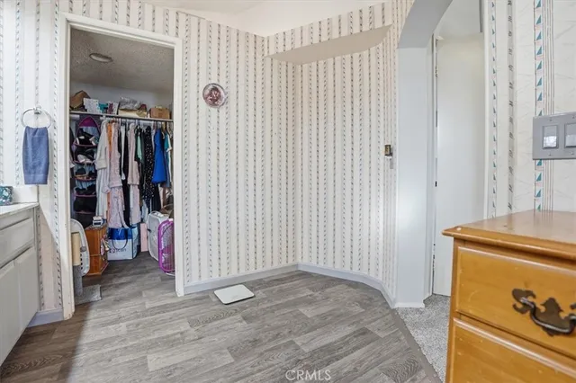 a view of a livingroom with wooden floor