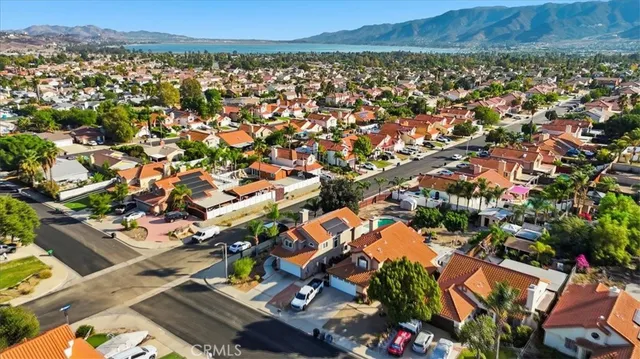 an aerial view of a city and mountain