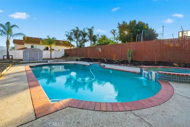 swimming pool view with a outdoor space