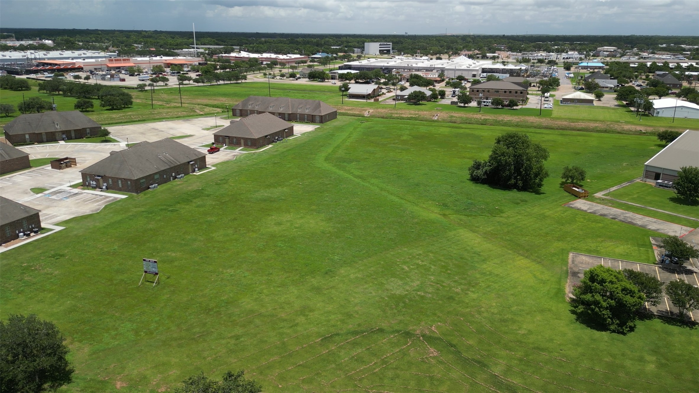 a view of a golf course with a lake