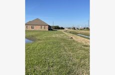 0 Lake Road Lake Jackson, TX 77566 - Photo 17 of 23 a view of a house with a yard