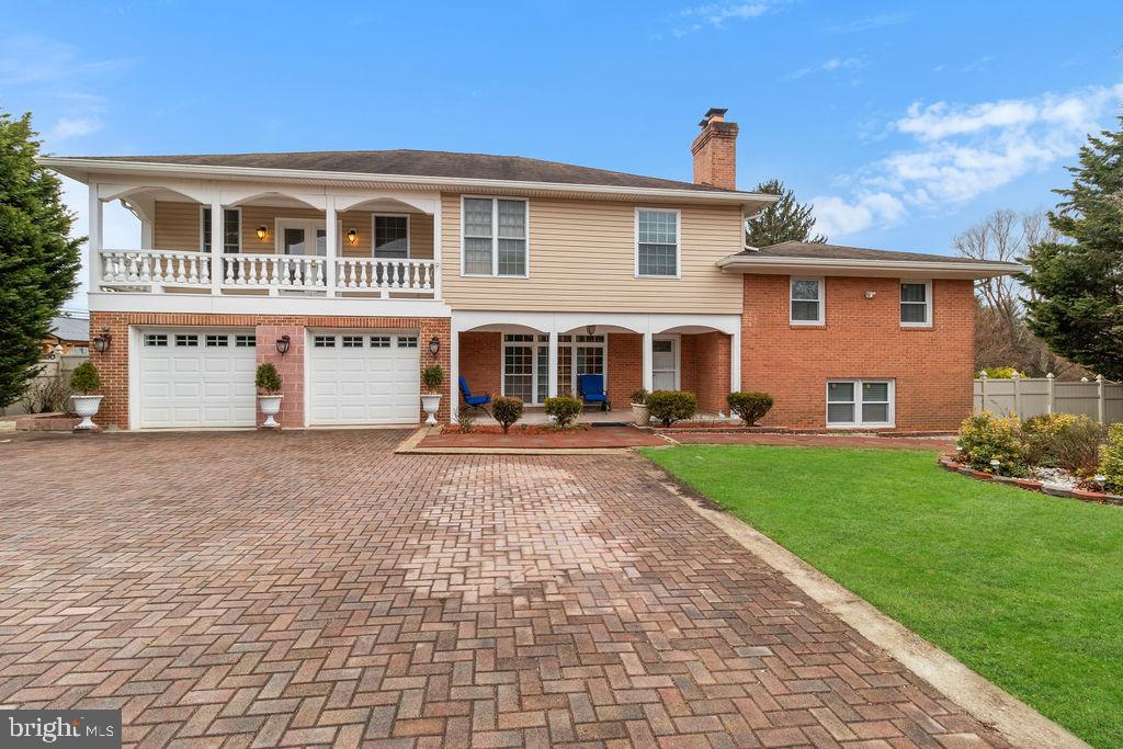 607 Valley Brook Drive Silver Spring, MD 20904 - Photo 1 of 67 a front view of a house with a yard