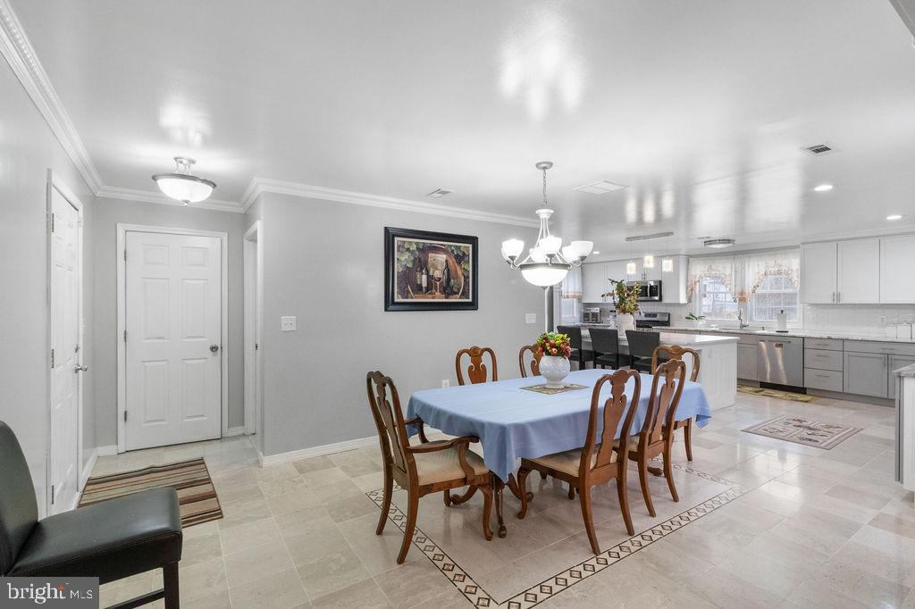 607 Valley Brook Drive Silver Spring, MD 20904 - Photo 6 of 67 a view of a dining room with furniture