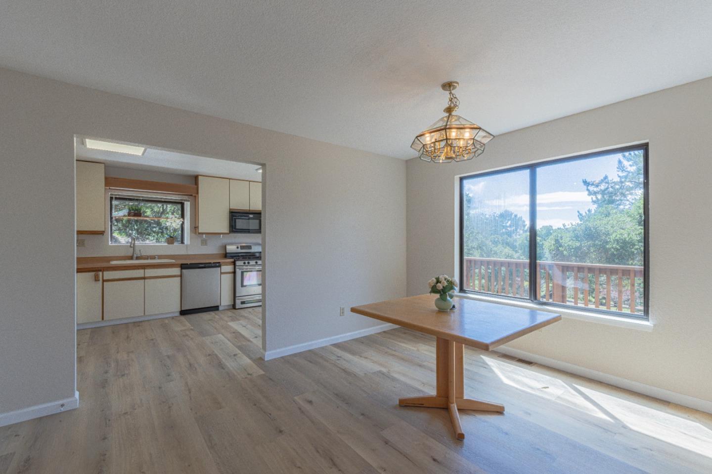6959 Valle Pacifico Road Salinas, CA 93907 - Photo 13 of 45 a workspace with wooden floor and a window