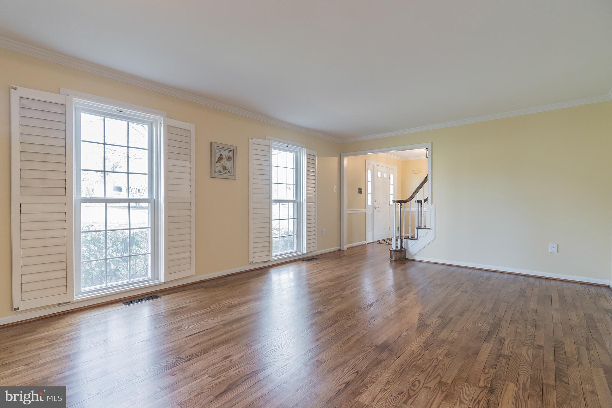910 Riva Ridge Drive Great Falls, VA 22066 - Photo 11 of 49 Formal Living Room w/Plantation Shutters