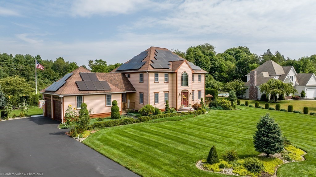 front view of a house with a yard