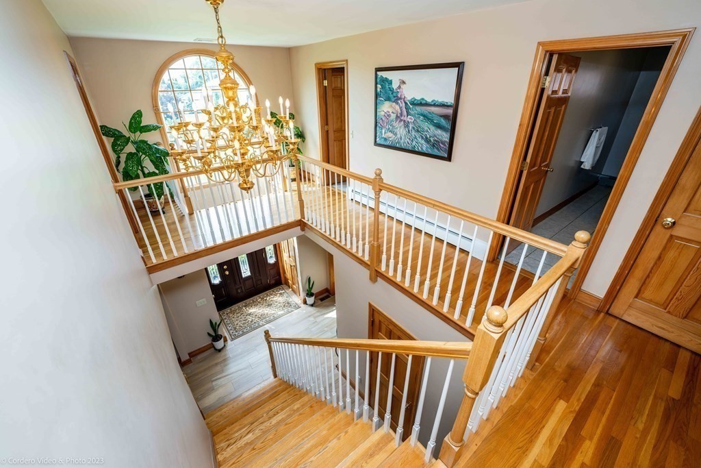 27 Peach Blossom Road Acushnet, MA 02743 - Photo 18 of 42 a view of an entryway with wooden floor