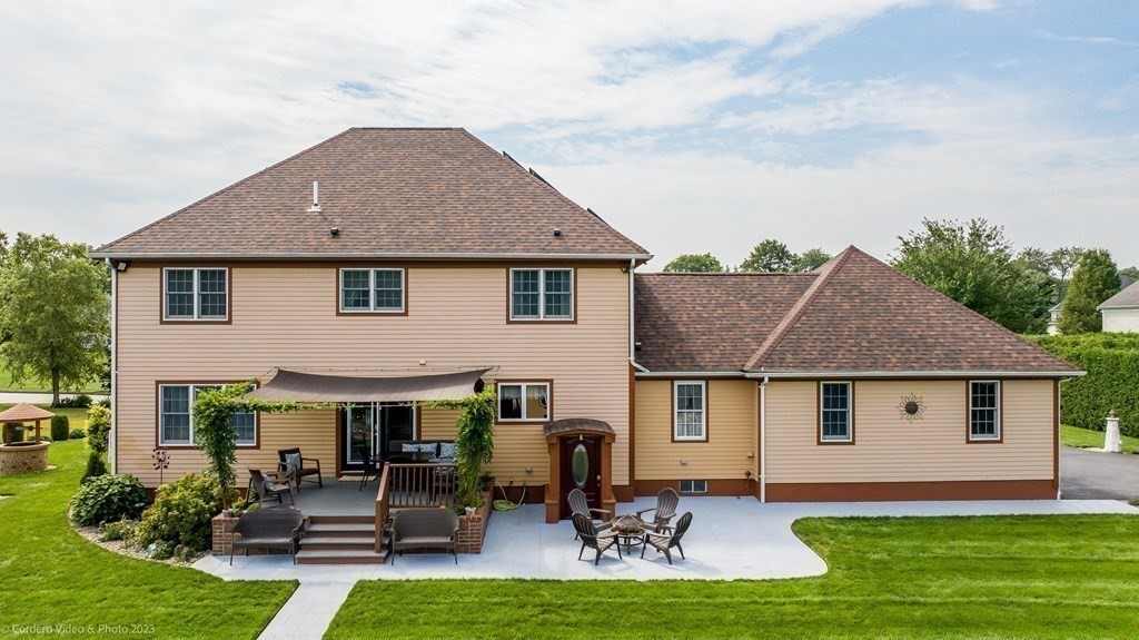 27 Peach Blossom Road Acushnet, MA 02743 - Photo 39 of 42 a aerial view of a house with swimming pool and a yard