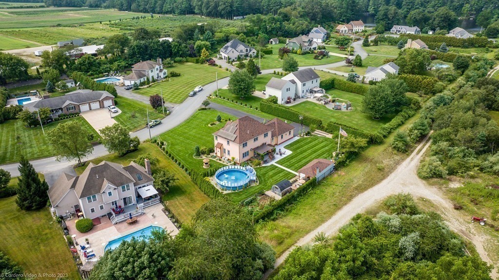 27 Peach Blossom Road Acushnet, MA 02743 - Photo 42 of 42 an aerial view of a house with a garden