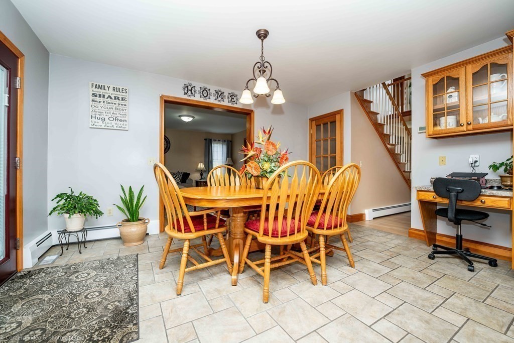 27 Peach Blossom Road Acushnet, MA 02743 - Photo 8 of 42 a dining room with furniture and window
