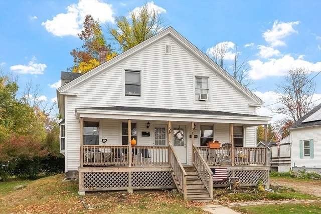 a front view of a house with a balcony