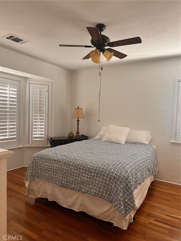 18090 Iris Avenue Riverside, CA 92508 - Photo 22 of 49 a bedroom with a bed and window