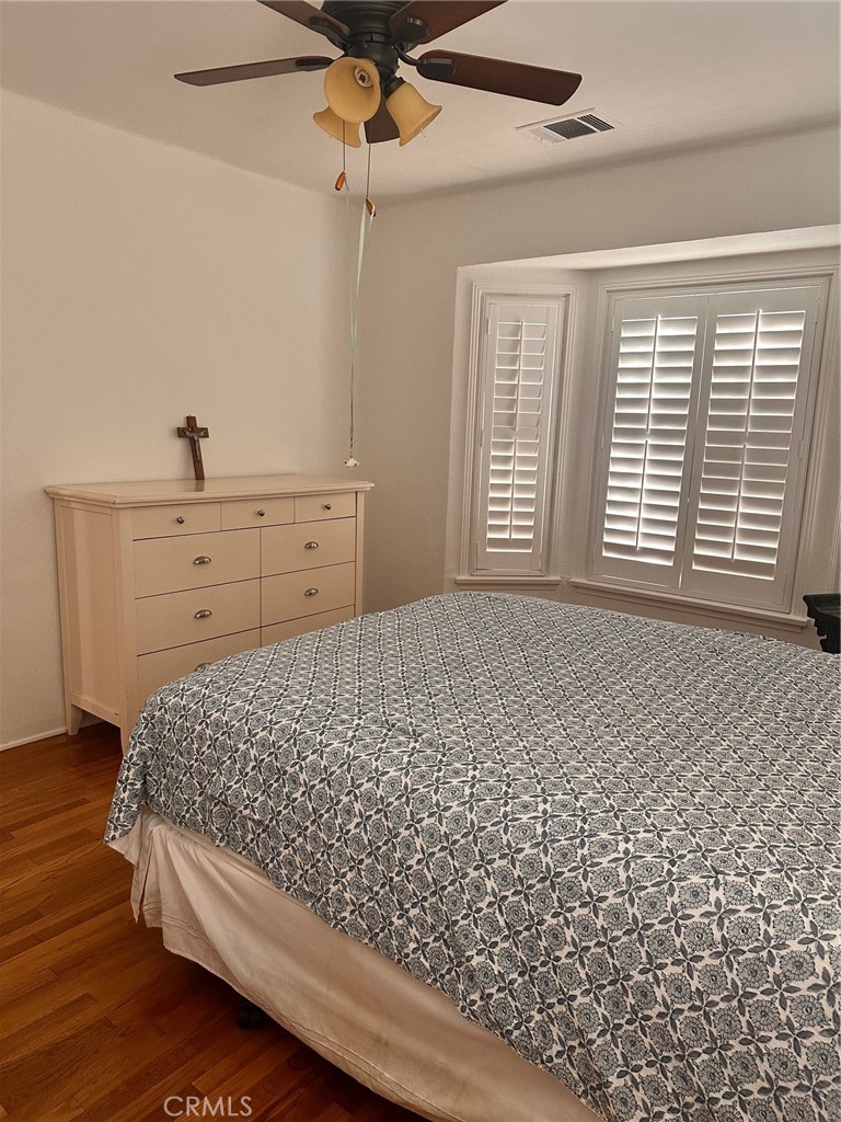 18090 Iris Avenue Riverside, CA 92508 - Photo 23 of 49 a bed room with a bed and a window