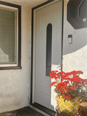 a front view of a house with a chandelier