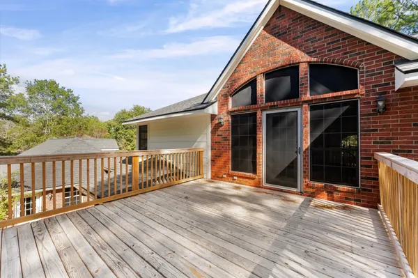 a view of the room with wooden ceiling