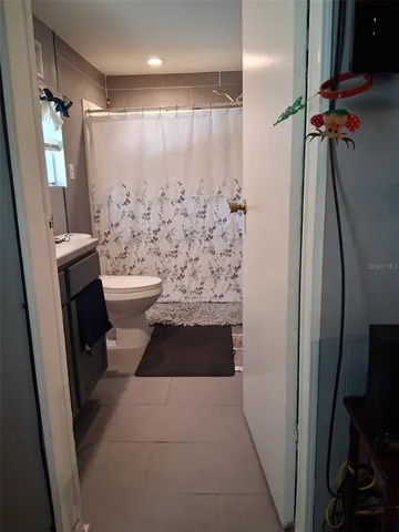 a bathroom with a sink and toilet
