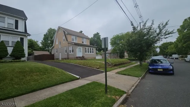 a car parked in front of a house