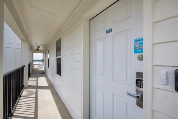 a view of a hallway with closet