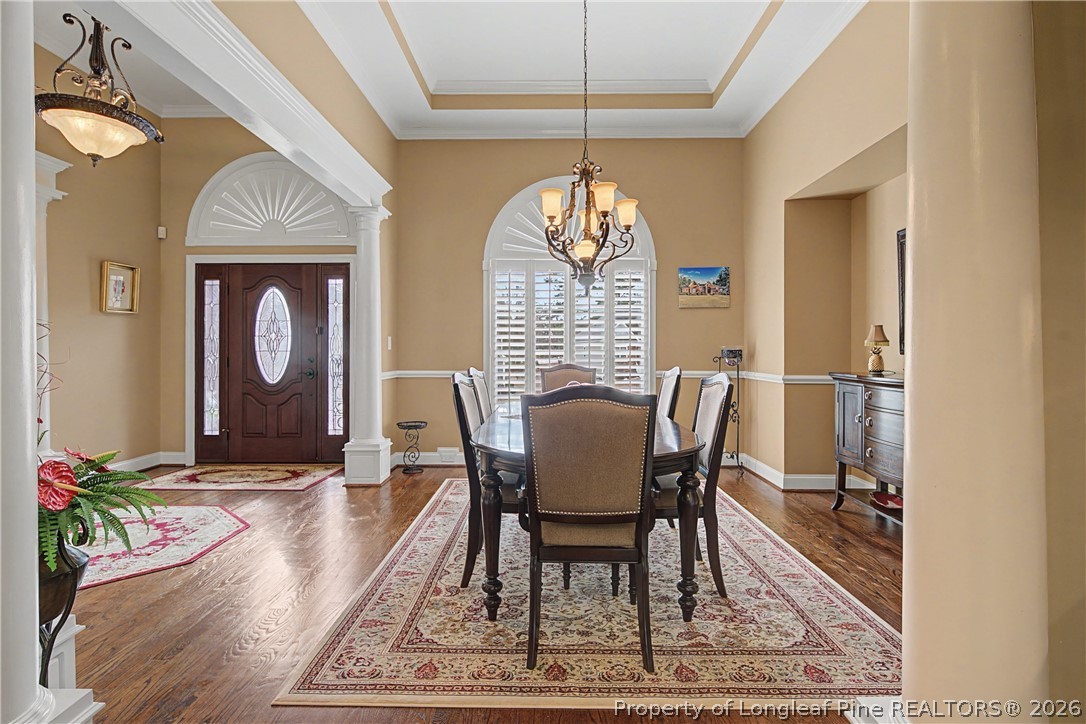 115 Micahs Way North Spring Lake, NC 28390 - Photo 12 of 39 a view of a dining room with furniture window and wooden floor