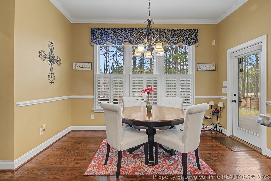 115 Micahs Way North Spring Lake, NC 28390 - Photo 17 of 39 a view of a dining room with furniture and window