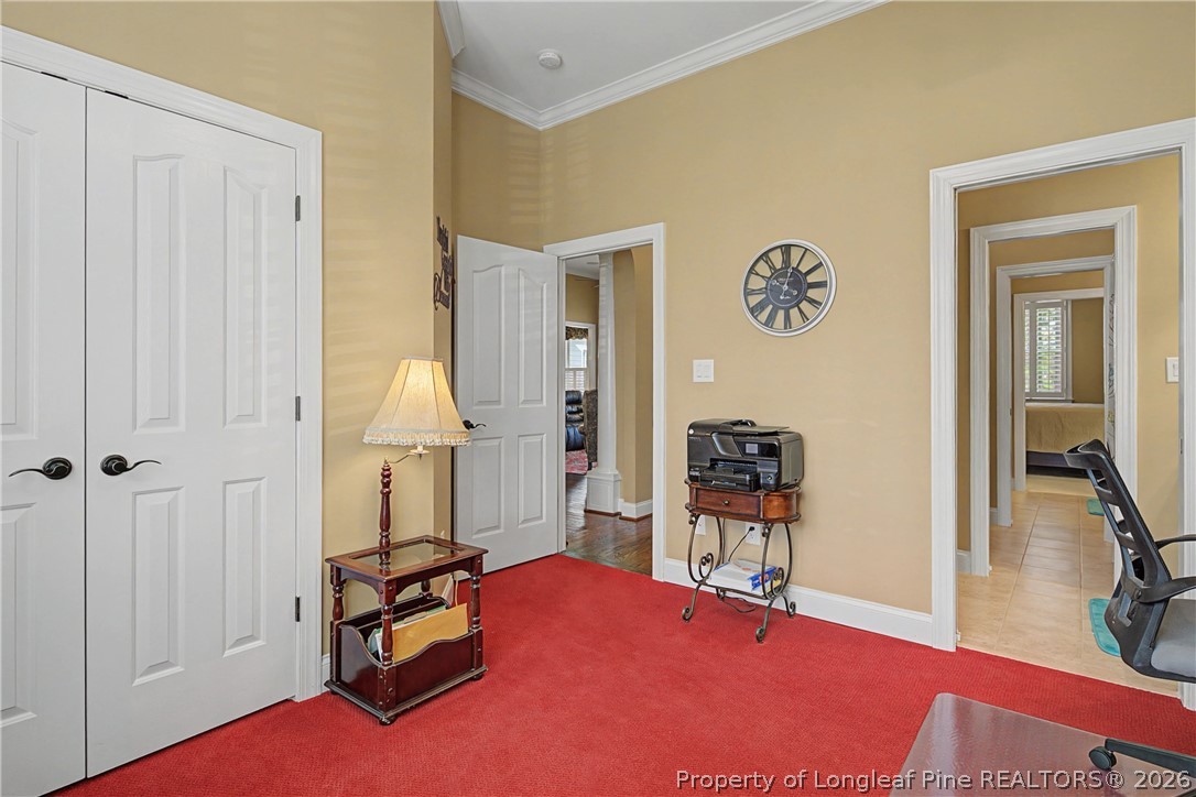 115 Micahs Way North Spring Lake, NC 28390 - Photo 33 of 39 a bedroom with furniture and a window