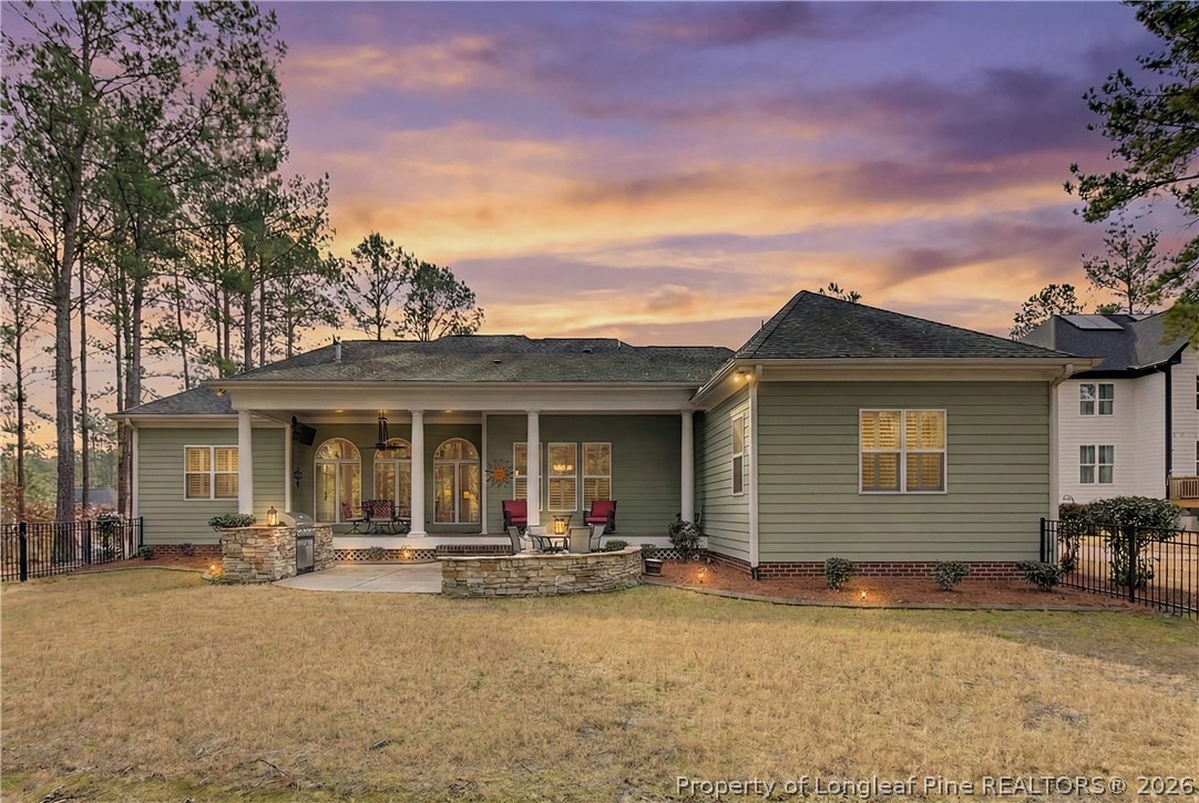 115 Micahs Way North Spring Lake, NC 28390 - Photo 6 of 39 front view of a house with a patio